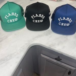 3 hats planes and papers